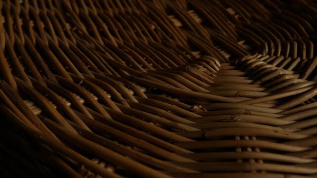 Woven Rattan Wicker Texture with Warm Sunlight, Close-Up Natural Basket Weave Pattern