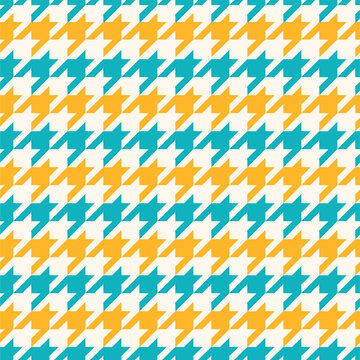 Bold seamless houndstooth pattern in teal, mustard and white, creating a vibrant geometric textile design ideal for fabric, fashion, wallpaper and packaging.