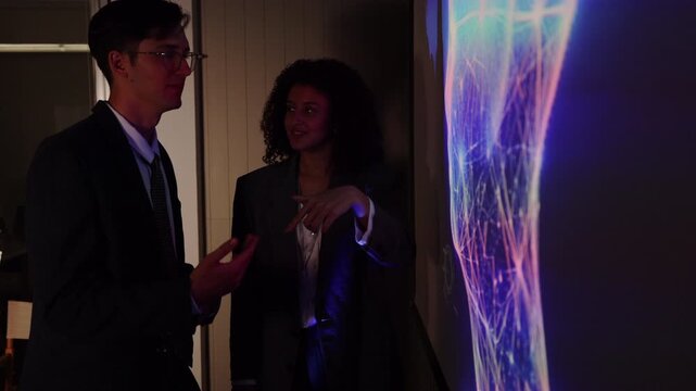 Seminar woman with man in conversation for ai governance, machine learning, Presenter promoting artificial intelligence solutions, Strategy plan to executive write prompt AI bot IT app program.