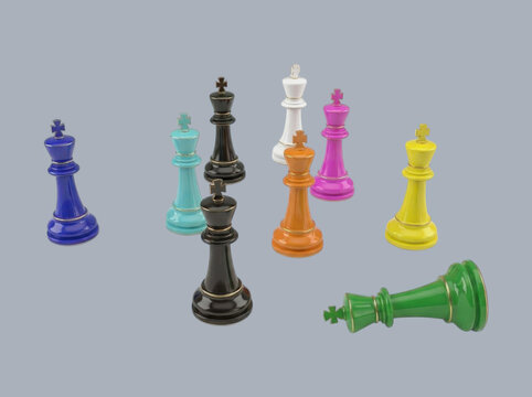 Colorful collection of chess kings standing on a grey background with strategy colorful leadership checkmate