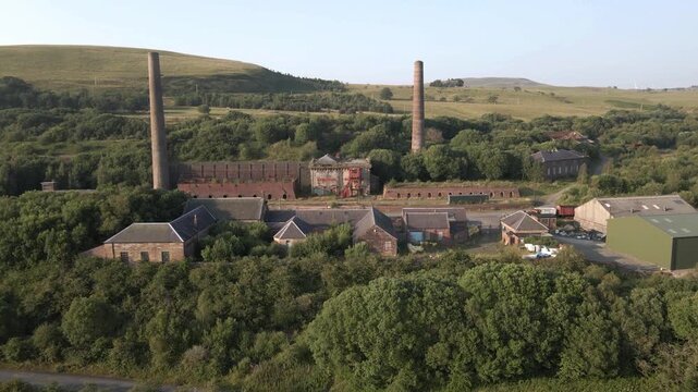 Drone Tracking Along Slag Heap Towards Abandoned Ironworks