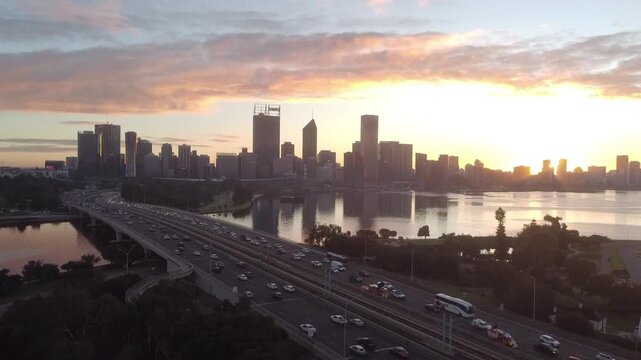 Drone footage of Perth city Western Australia at sunrise and traffick