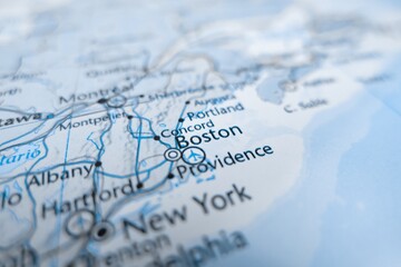 Obraz premium Map of Boston styled in grey color. Selective focus on label, close-up view