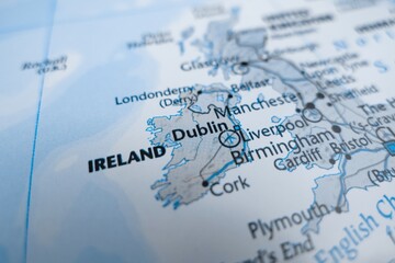 Obraz premium Map of Dublin styled in grey color. Selective focus on label, close-up view