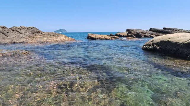 Sunlight Caustics And Refractions On Shallow Crystal Clear Water Over Rocky Ocean Floor, 4K b-roll