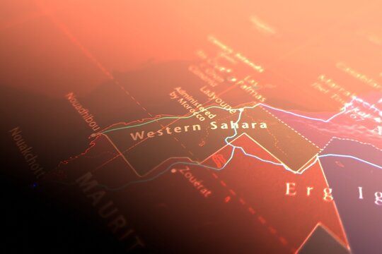 Map of Western Sahara styled in cyber red colors. Selective focus on label, close-up view