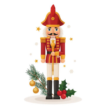 Christmas nutcracker soldier with pine branches and holly