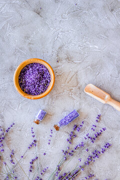 natural cosmetics with lavender and herbs for homemade spa on stone background top view mock up