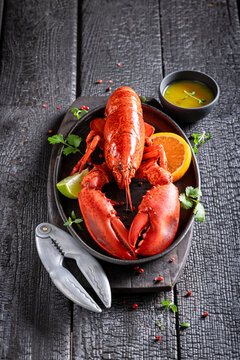 Boiled and spicy lobster as fresh seafood meal.