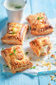 Homemade sausage in puff pastry as a snack for breakfast.
