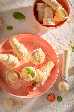 Homemade and juicy strawberry ice cream as refreshment in summer.