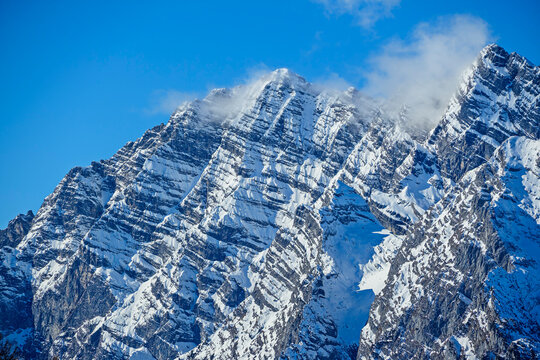 Snow covered Watzmann mountain peak in Bavaria Germany