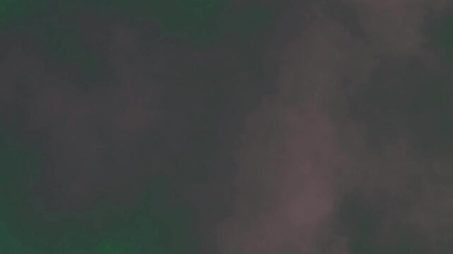 Some clouds in it smoke coming out of the sky man suit tie cloud on map africa is shown middle isolated on green screen background