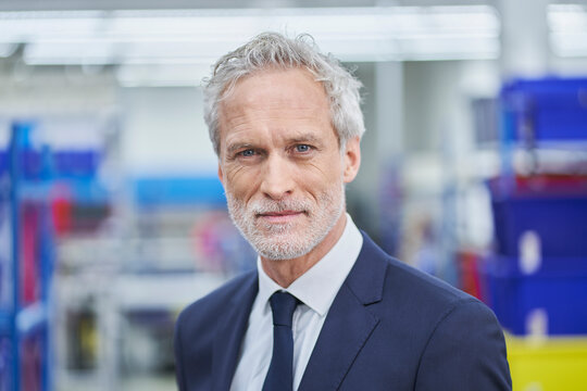 Confident male manager in factory