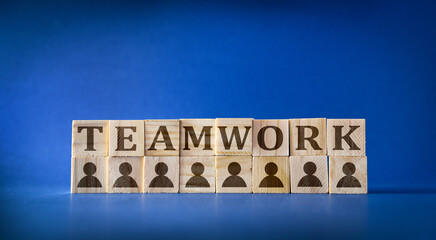 Obraz premium Teamwork Concept with Wooden Blocks and Icons