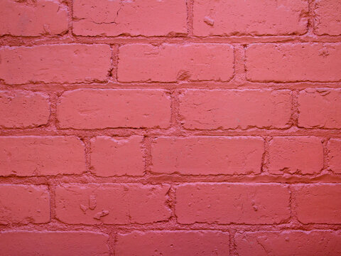 Old red painted brick wall