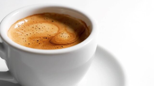 Fresh Espresso in White Cup on White Background