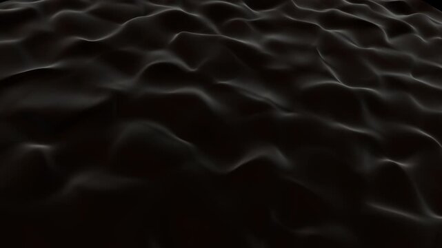 Deep, dark viscous waves rolling across a low-angle perspective horizon. Sophisticated fluid backdrop designed for minimal text placement, moody music videos, and premium branding