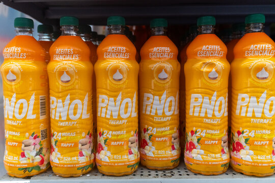Villa de Alvarez, Colima. Mexico. June 26, 2026: Pinol Therapy Cleaning Product Bottles Displayed on Bright Supermarket Shelf