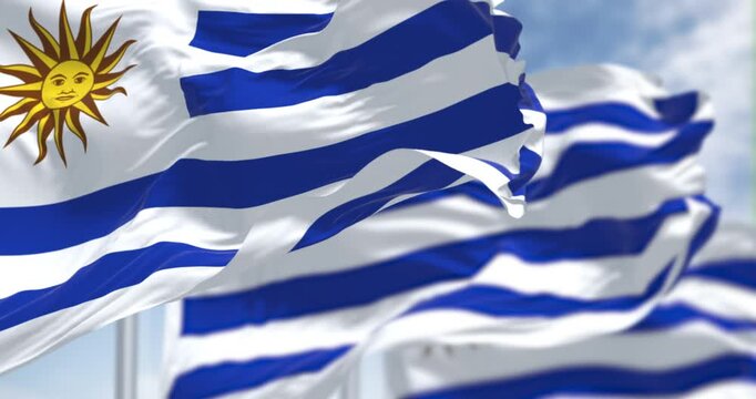 Uruguay national flags fluttering in the wind on a sunny day