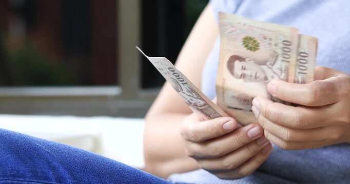 Female hands counting banknotes, personal finance, budgeting, savings, cash payment, expense management, and everyday financial planning, close-up