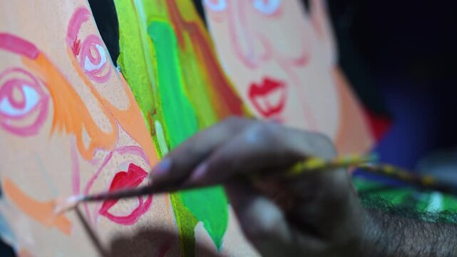 A macro shot tracks a painter&rsquo;s brush tracing bold facial outlines on a retro film illustration, saving an endangered South Asian pop art industry inside a traditional studio workshop in Dhaka.