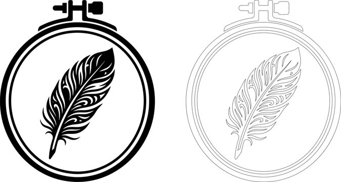 Black feather design inside embroidery hoop with circular frame