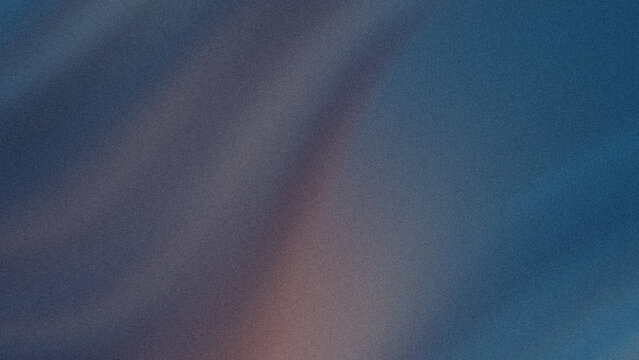 A close up view of dark blue denim fabric showing the rough texture and woven cotton material details