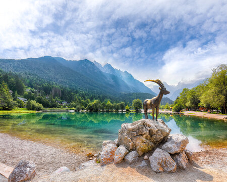 Gorgeous landscape on Jasna lake with beautiful reflections of the mountains.
