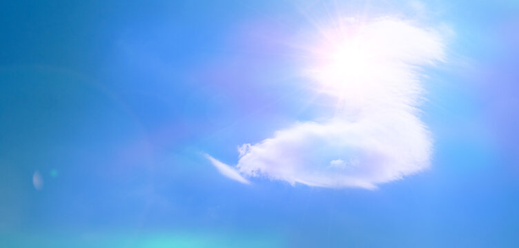 Sky background and shining sun with some cloud. Extreme weather and heat wave concept. Global warming effects