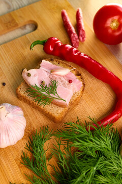 Traditional Ukrainian Salo Sandwich with Spices and Vegetables