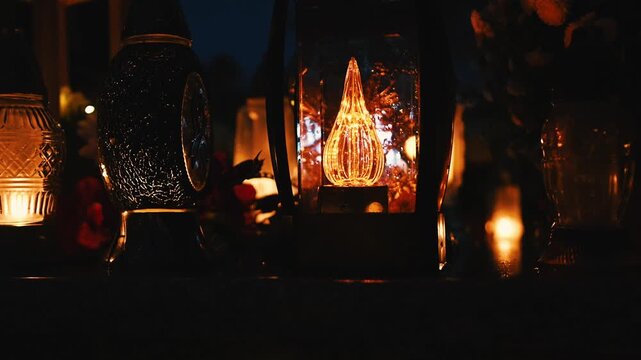 Halloween At The Cemetery Late In The Evening With Lamps