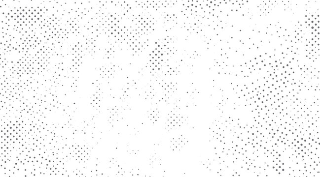 Gray dots of varying sizes scattered across a white background creating a textured pattern