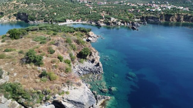 Drone footage of Paralia Dipli, Greece, showcasing secluded turquoise coves, rocky shoreline, and pristine Mediterranean coastal scenery.