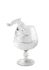 Glass with water splashing inside while being filled at a bar during evening hours © Mentor56