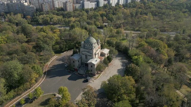 Gothic Cenusa Crematorium In Tineretului Park Bucharest City Center Romania Drone Swing Pan 4K 30FPS