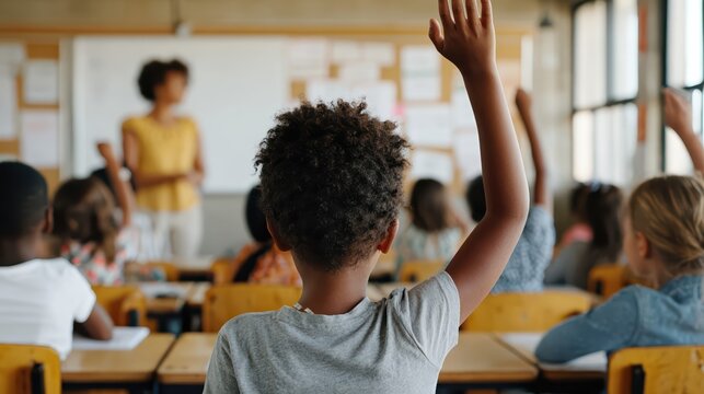 Schoolchildren eagerly raise their hands in a sunny classroom. The room buzzes with youthful energy, colorful posters, and engaged learning.
