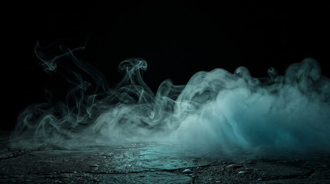 Abstract blue smoke on a dark textured surface mysterious fog or steam rising from the ground against a black background cinematic atmosphere for design projects