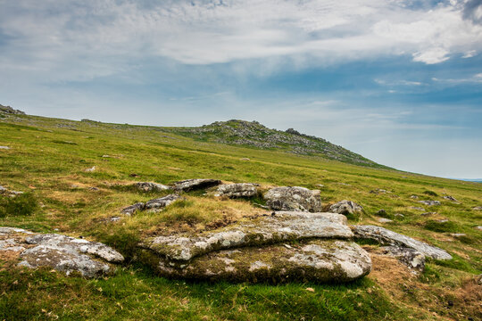 Lovely Summer day landscape image of Rough Tor on Bodmin Moor in English countryside