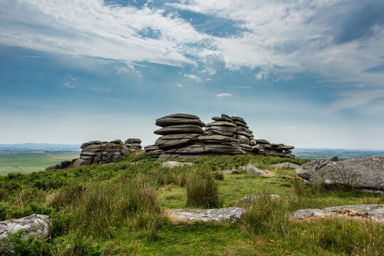 Lovely Summer day landscape image of Rough Tor on Bodmin Moor in English countryside