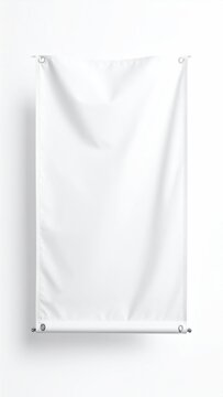 A blank white banner hangs vertically from two metal grommets on a white wall