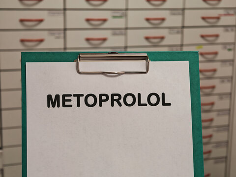 METOPROLOL beta 1 blocker for hypertension angina and heart failure displayed on a clipboard in a pharmacy