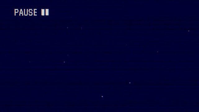 4K Classic VHS Pause Effect Featuring Analog Tape Damage, CRT Scanline Overlay, Film Grain and Vintage Video Background.