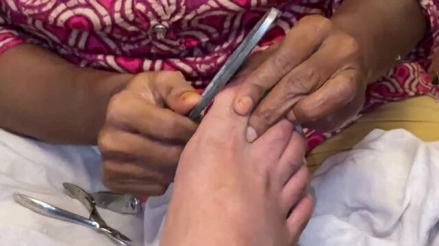 The Indian pedicure process being done
