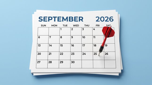 Red dart pointing at September 2026 calendar page on blue background focused on goal targeting and deadline planning concept