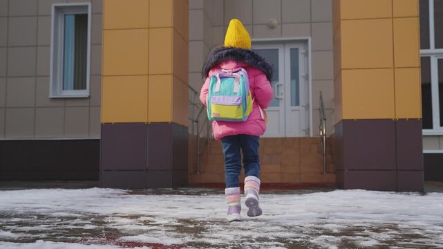 Little Child Kid girl elementary school student, Child with school backpack, charming preschooler goes classes high school, Happy family, Girl daughter student with backpack hurries class, little