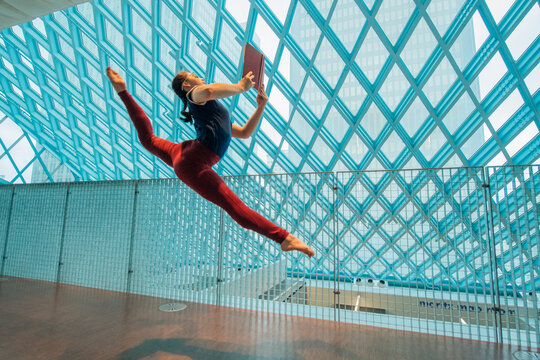 A dancer leaps gracefully 