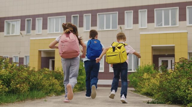 Children running to class, colorful backpacks, modern school exterior, elementary students, eager learners, friends arriving, academic journey, sunny morning, campus life, ready for the day, Three