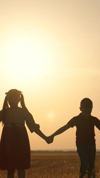 boy girl mother father son daughter dream teamwork hands up sun silhouette religion faith together vacation travel Christianity, family holiday traditions, children s leisure activities, parenting