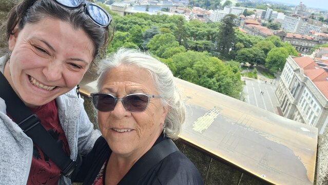 Mother and daughter taking a selfie on vacation in porto, portugal